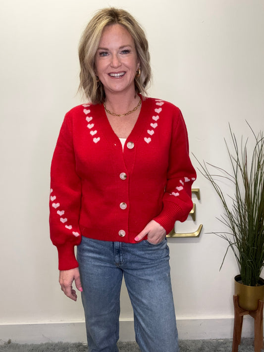 cute button front red cardigan sweater with pink embroidered hearts on trim Valentine’s Day so me date night