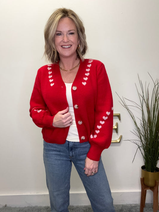 cute button front red cardigan sweater with pink embroidered hearts on trim Valentine’s Day so me date night