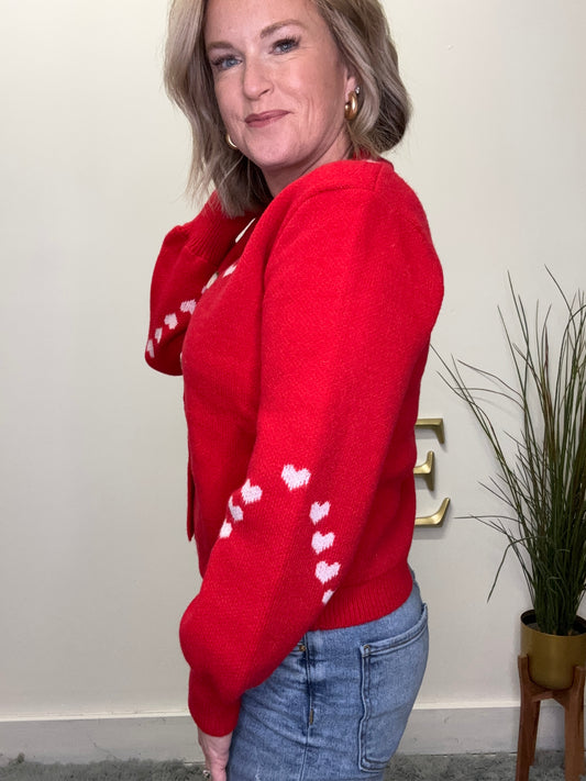 cute button front red cardigan with pink embroidered hearts on trim Valentine’s Day so me