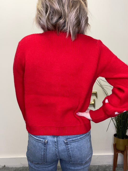 cute button front red cardigan sweater with pink embroidered hearts on trim Valentine’s Day so me date night